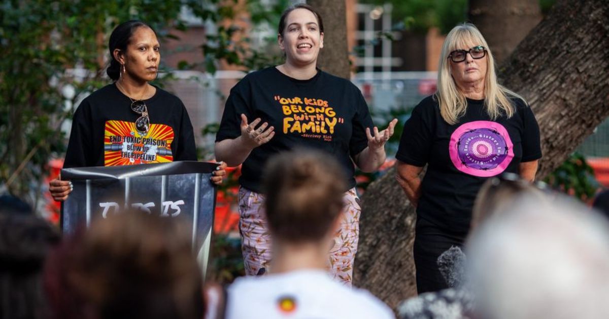 Rudy Wharton of Sisters Inside, Maggie Munn, National Director of Change the Record, and Sisters Inside CEO Debbie Kilroy at a rally outside Queensland Parliament House on 24 August